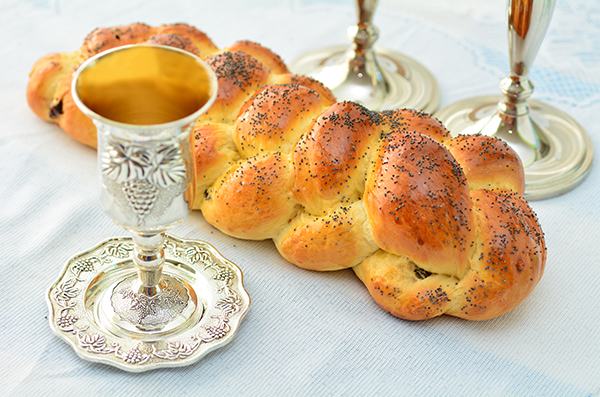 Wine, challah and candlesticks for Shabbat